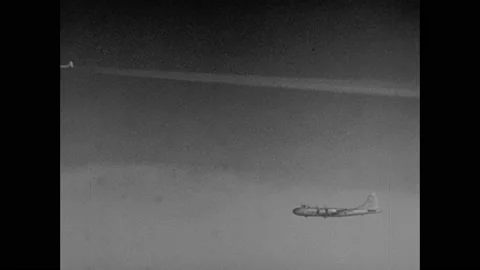 1940s: Bomber planes in flight out window of plane. Squadron of bombers in Video stock 159169972