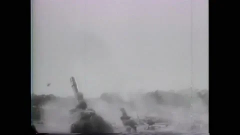 1940s: Bombs explode on ground. Bombs explode around tanks. Soldiers walk across Vídeos de archivo 160354407