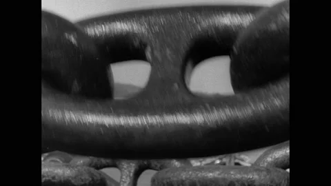 1940s: Chain on side of ship. Shots of chains. Paper in typewriter. Sailors sort Stock Footage 151605760