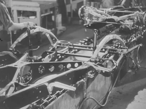 1940s: Chassis on assembly line Stock Footage 219443353