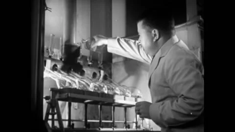 1940s - Chemists work on developing rayon in their labs. Video stock 155855461