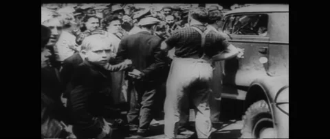 1940s: Crowd of people stand outside, li... | Stock Video | Pond5