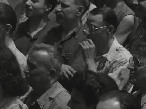 1940s: Crowd standing outdoors Video stock 231729665