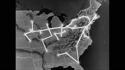 1940s: Dots flash on a map showing television transmission reach. Overlay ballet Stock Footage 161972449