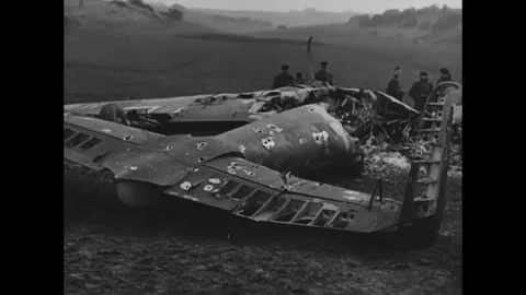 1940s - Downed Luftwaffe planes go up in flames, and victorious RAF pilots get Stock Footage 159136565