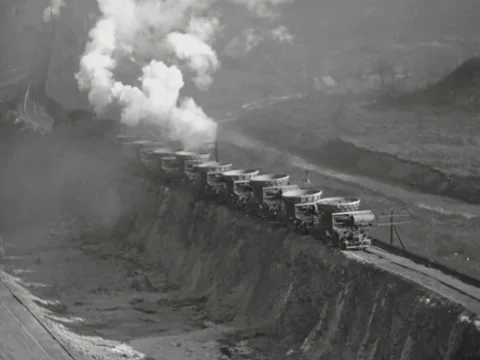 1940s: Dumping molten slag Stock Footage 231933094