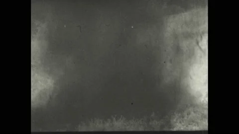 1940s: Explosions.  Mountain.  Car.  Bridge.  Field.  Home.  Statistics posted Stock Footage 155116823