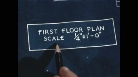 1940s: first floor blueprint plan for new house. Hand writes out equation on Stock Footage 189945676