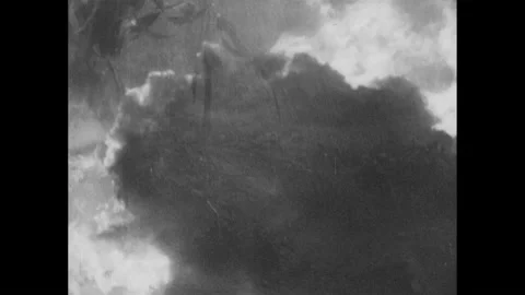 1940s: Flood waters run through streets. Family drives horse drawn wagon past 스톡 동영상 231417328