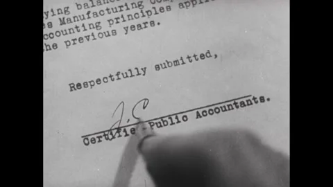 1940s: Front page of the audit report. Accountant signing the report. Man Stock Footage 296505367