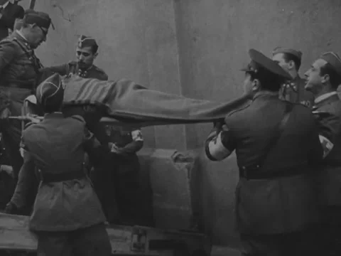 1940s: German sailors load stretchers onto ship Video stock 229727267