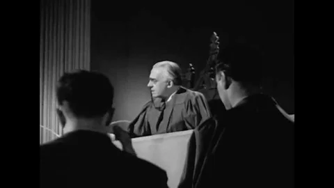 1940s - A guardian angel testifies for the ghost of a reckless driver, on trial, Video stock 132201380