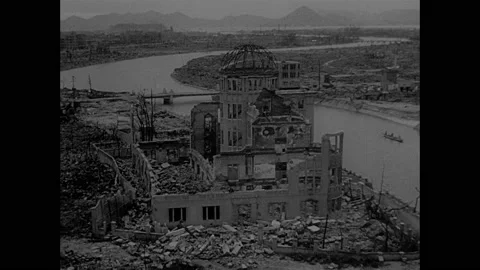 1940s: Hiroshima in ruins after atomic blast.  People walk on bridge. 스톡 동영상 158443789