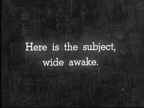 In a 1940s hypnosis experiment, the subject is put into a deep sleep. Stock Footage 75292858