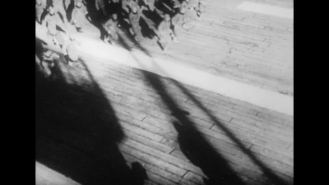 1940s: Japanese soldiers on carrier run to planes / Long shot of pilot in plane. Stock Footage