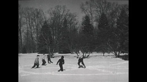 1940s: Kids play game in snow. Stock Footage