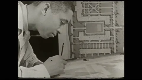 1940s: Man works on architecture on drafting table. Person makes model of Stock Footage 163609728