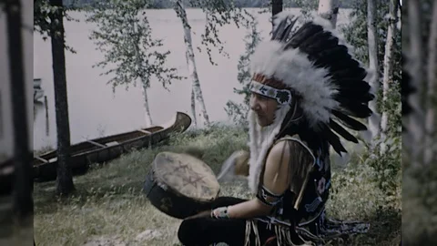1940s Native American Indian Man Sings Beats Drum Vintage Film Old Home Movie Stock Footage