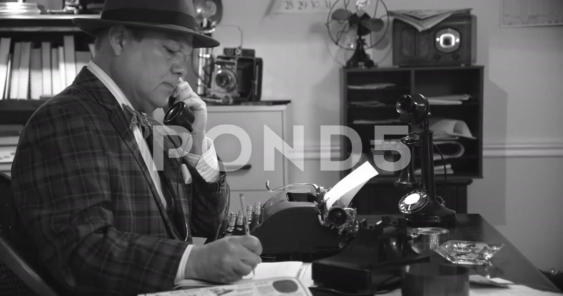 1940s News Reporter At His Desk On The Phone Taking Notes Video 90796455 1940s News Reporter At His Desk On The Phone Taking Notes Video 90796455