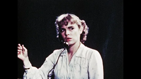 1940s: Operator looks confused. Puppet speaks into phone. Puppets wrestle to Stock Footage 104768169