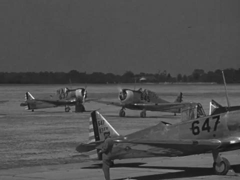 1940s: Plane pulls into position on tarmac at Gunter Field Stock Footage 231815158
