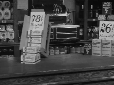 1940s: Prices on store counter Stock Footage 231726838