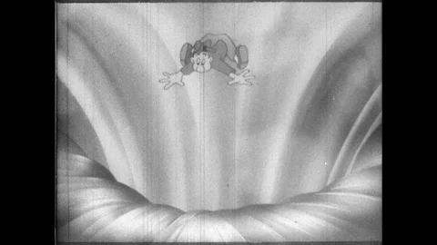 1940s: Private Snafu falls down a long chasm into cooking pot in hell. The devil Stock Footage 89766987