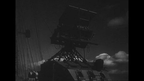 1940s: Radar transmitter on ship / Closer view of transmitter. Stock Footage