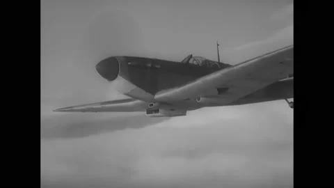 1940s - An RAF Spitfire flies through the clouds. Stock Footage 159136574