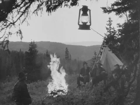 1940s: Ranchers around a campfire Stock Footage 229307184
