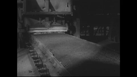 1940s: Residue ignited on flat machine surface. Stock Footage 74522937