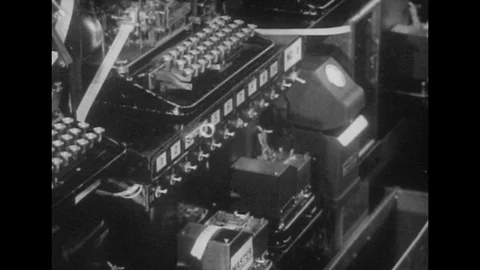 1940s: Rows of cryptography machines / Close up, code printed on paper / 스톡 동영상 74507740