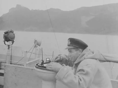 1940s: Sailor using gyroscope Video stock 221395455