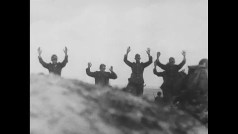 1940s: Soldiers with hands in air / Close up, soldiers marching / Soldiers march Stock Footage