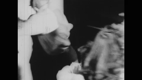 1940s: Square dance.  Man calls out directions. Stock Footage 98752867