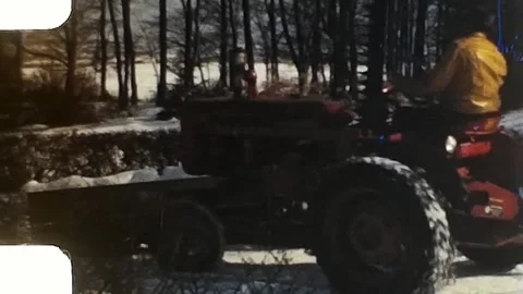 1940s tractor in the snow 3 of 7. Vintage 8mm Home Video. Stock Footage 257963322