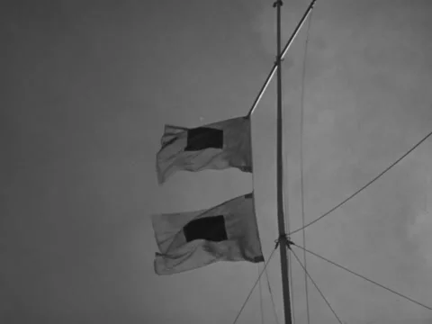 1940s: Two 'S' semaphore flags on pole Stock Footage 229729637