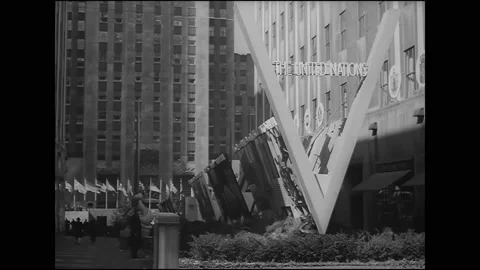 1940s - United Nations flags fly over Rockefeller Plaza in New York City. Stock Footage 157166793