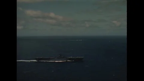 1940s - US Navy planes fire on enemy planes in the Pacific. Stock Footage 115558062