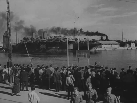 1940s: Wide shot of British ship in harbor Stock Footage 229727479