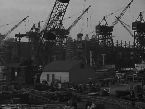 1940s: Wide shot of shipyard Stock Footage 231725866