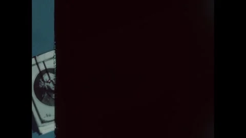 1940s: Woman operates an adding machine. A promissory note for $1000. Two Stock Footage 280688208