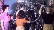 1940S Women Family Decorates Ww2 Christmas Trim Tree Vintage Film Home Movie  Stock Footage