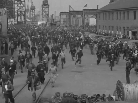 1940s: Workers leaving at shipyard Stock Footage 231725661