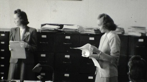 1940s WW2 Secretaries File Cabinet Women Office Workers Vintage Film Home Movie Stock Footage