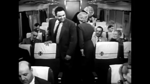 1941 - Bob explores the train and eats lunch, cooks prepare food for the dining Stock Footage 79429296