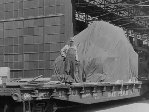 1941: Covered tanks on train Stock Footage 157946405