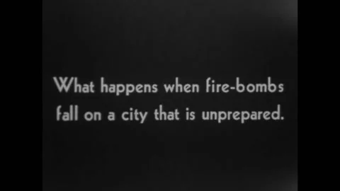 1941 - Seattle firemen work to put out a raging inferno taking down a building. Stock Footage 246363690