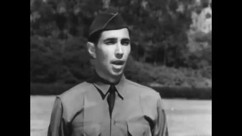 1941 - A United States Army instructor demonstrates the positions of parade rest Stock Footage