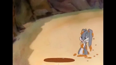 1942 - In this animated film, Elmer Fudd is almost buried in Bugs Bunny's rabbit Stock Footage